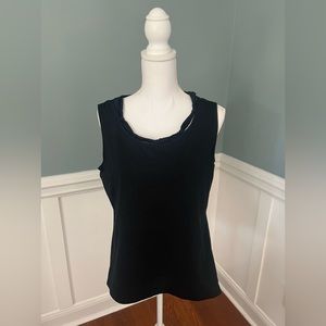 Women’s black top with detail at neckline. Sleeveless top.